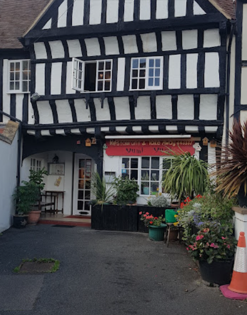 The timber-framed exterior of Yumi Yumi on Merstow Green